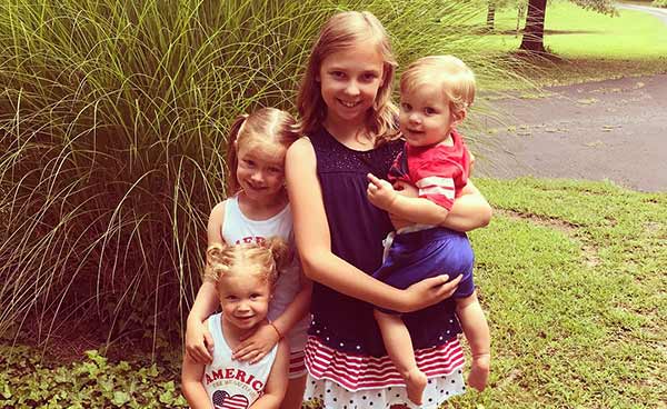 Image of Jeremy Bumpus's children; three daughters and one son