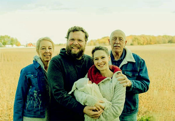 Image of Charles Pol with wife, daughter, and parents